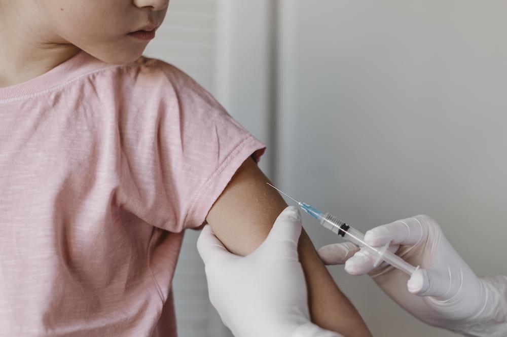doctor-administering-vaccine-kid.jpg